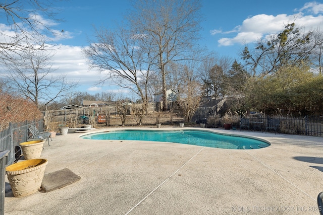 view of pool featuring a patio and a playground