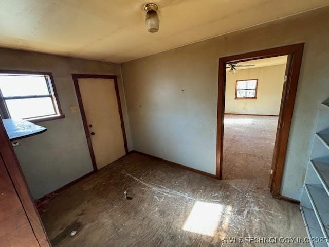 entryway featuring ceiling fan