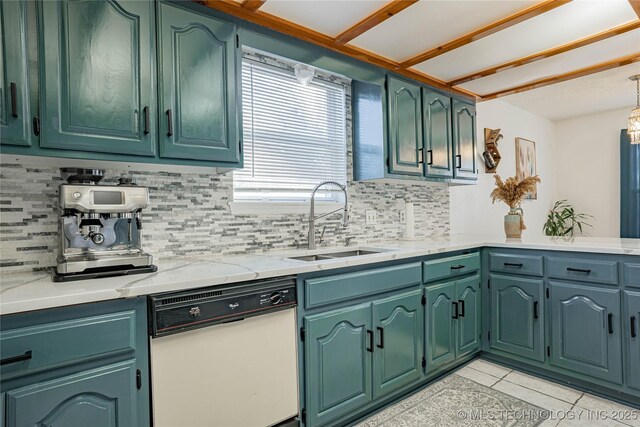 kitchen featuring sink, backsplash, light tile patterned floors, and dishwasher