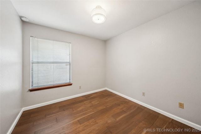 empty room with hardwood / wood-style floors