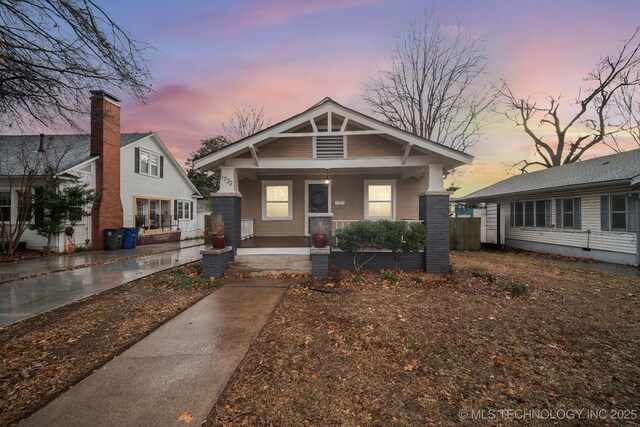 doorway to property with covered porch