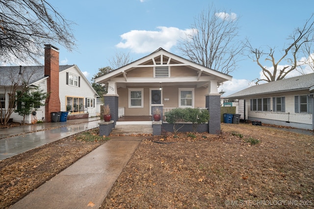 bungalow-style house featuring covered porch