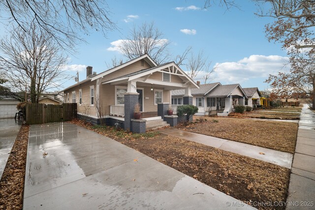 bungalow-style home with covered porch