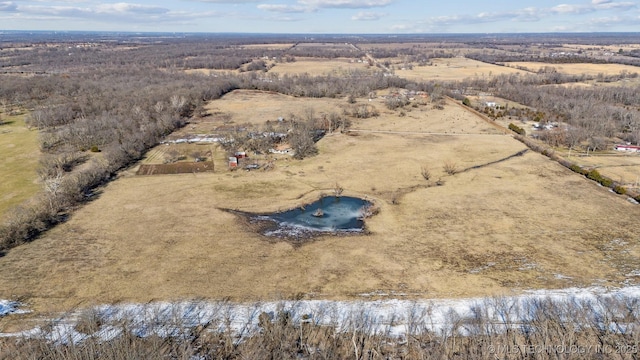 drone / aerial view with a water view and a rural view