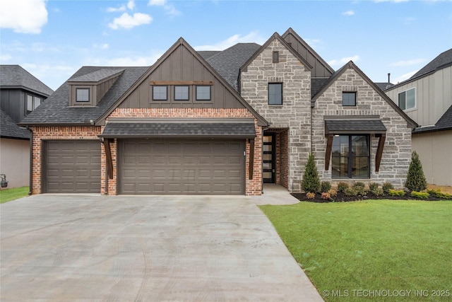 view of front of home featuring a front yard and a garage