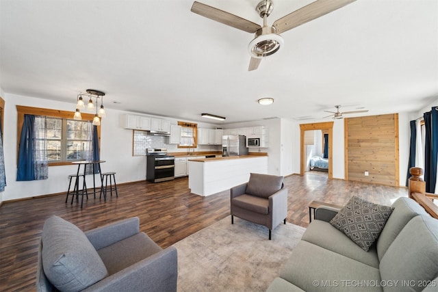 living room featuring dark hardwood / wood-style floors