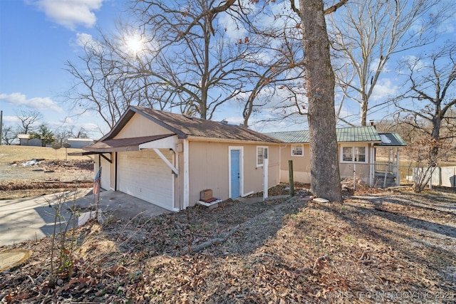 view of home's exterior featuring a garage