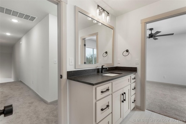 bathroom featuring recessed lighting, visible vents, baseboards, vanity, and a ceiling fan