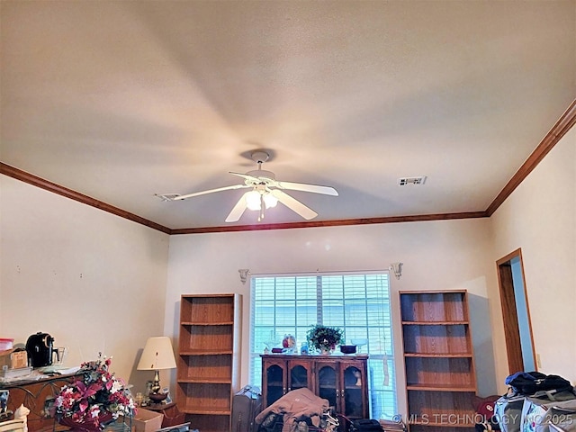 home office featuring ceiling fan and crown molding