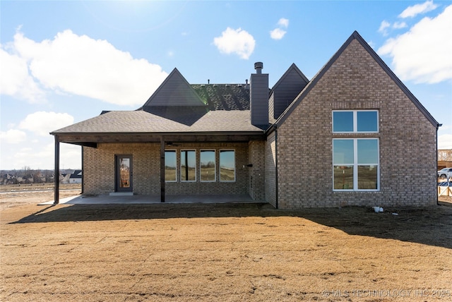 rear view of house with a patio area