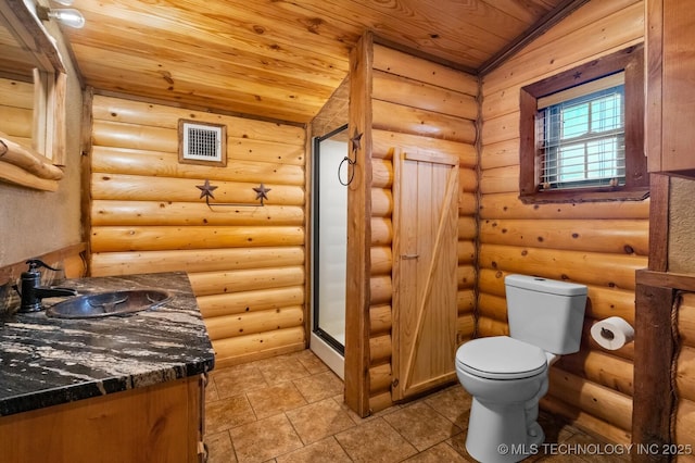 bathroom featuring vanity, log walls, and vaulted ceiling