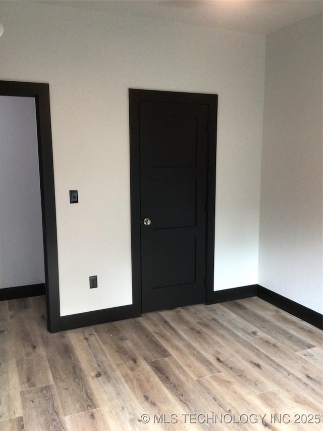 empty room featuring light hardwood / wood-style flooring