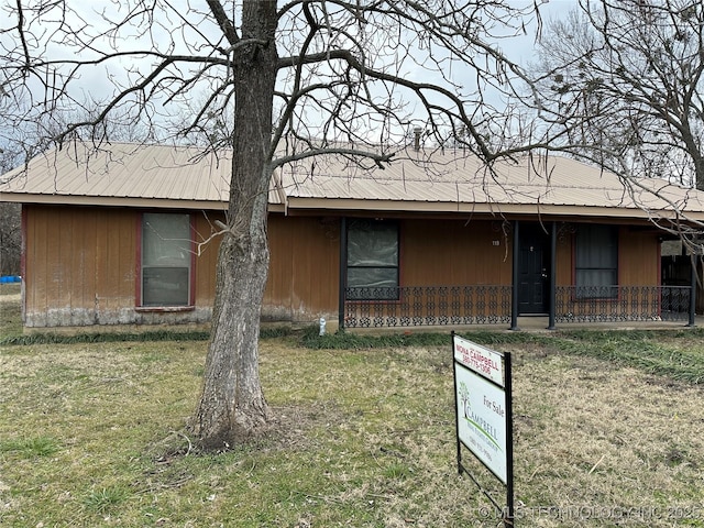 119 S Arkansas St, Caddo, OK 74729 - view of front of house featuring a front yard