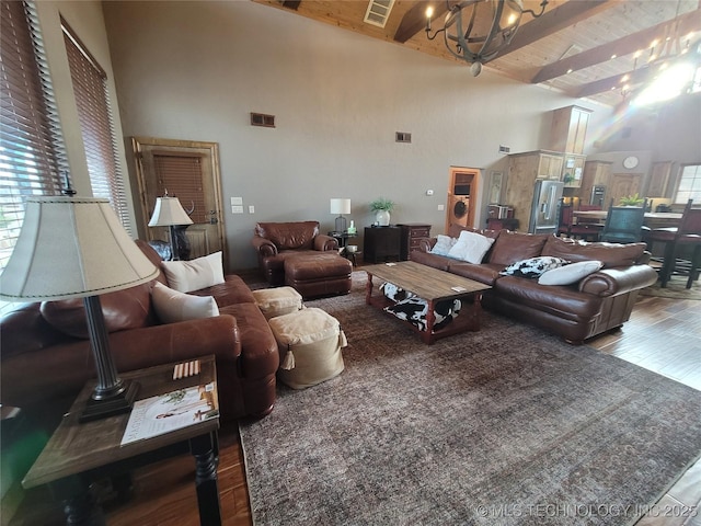 living room featuring high vaulted ceiling, wood ceiling, hardwood / wood-style floors, and beamed ceiling