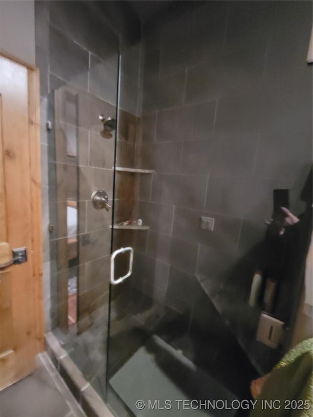 bathroom with an enclosed shower