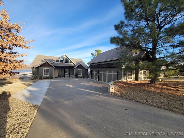 craftsman house with a garage