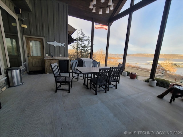 sunroom featuring sink