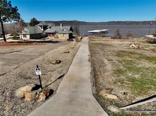 view of road featuring a water view