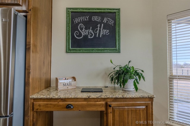 room details featuring stainless steel refrigerator