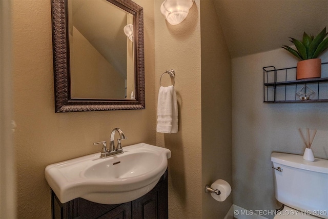 bathroom with sink and toilet