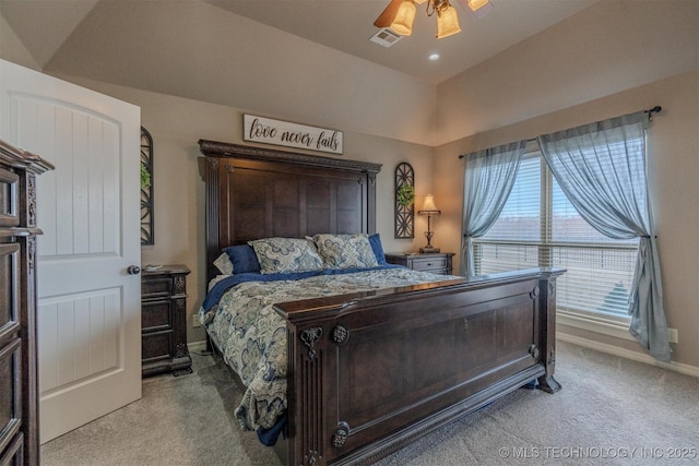 carpeted bedroom featuring ceiling fan and lofted ceiling