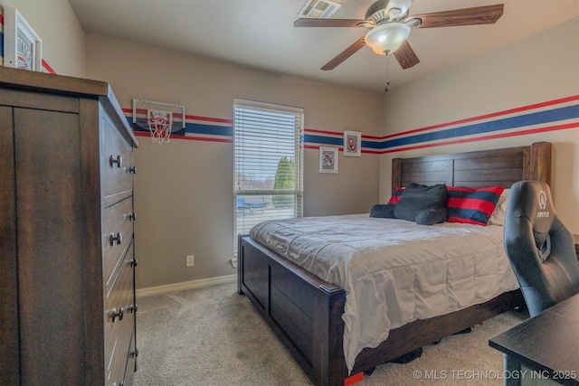 bedroom featuring ceiling fan and light colored carpet