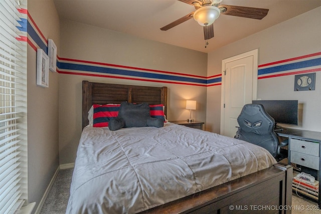 bedroom featuring ceiling fan and carpet flooring