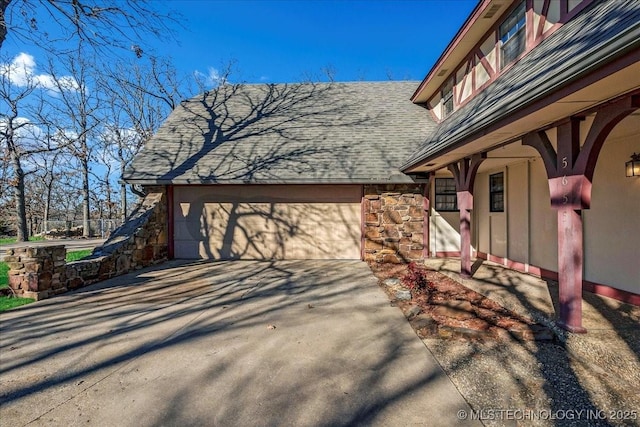 view of property exterior with a garage