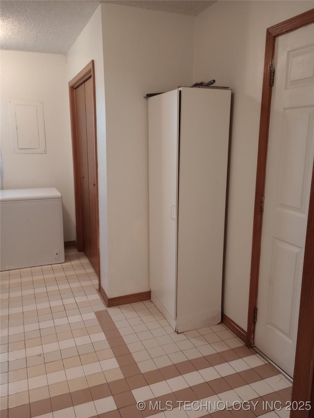 bathroom featuring a textured ceiling