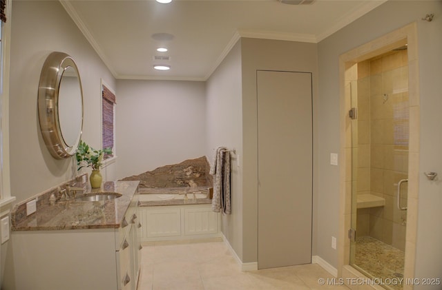 bathroom with independent shower and bath, ornamental molding, tile patterned floors, and vanity