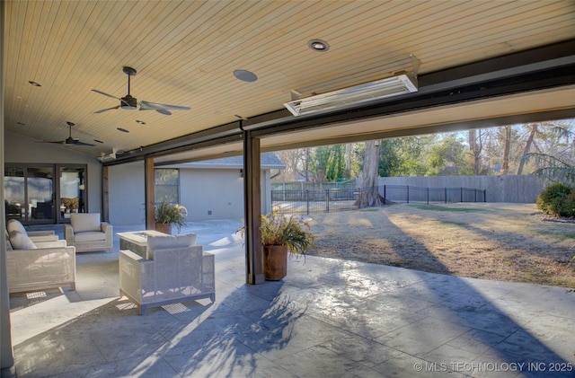 view of patio featuring ceiling fan and an outdoor living space