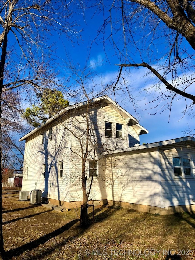 view of property exterior with central air condition unit