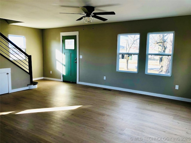 entryway with hardwood / wood-style floors and ceiling fan