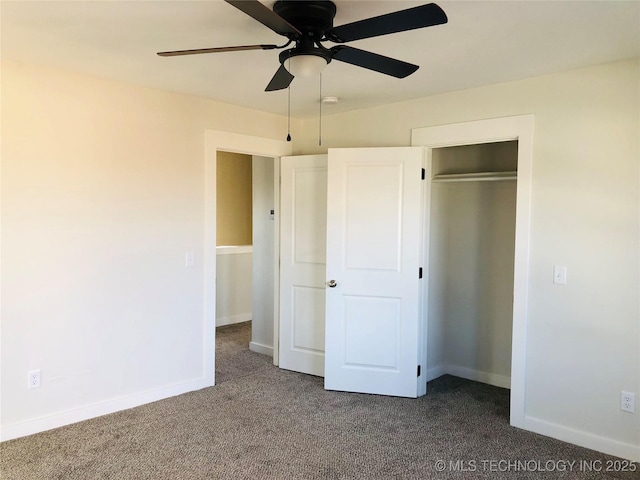 unfurnished bedroom with carpet, ceiling fan, and a closet