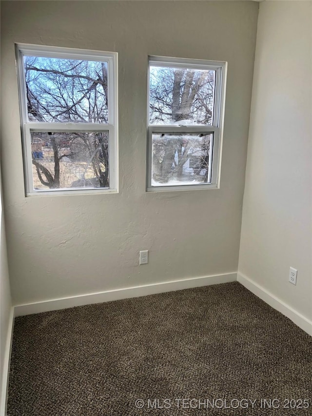 view of carpeted spare room