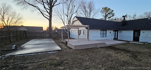 exterior space with a pergola, a deck, and a patio