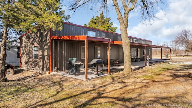 rear view of house with a patio area