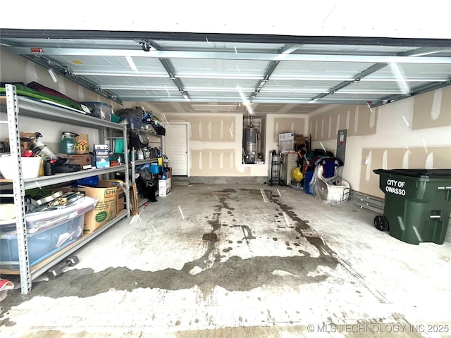 garage featuring gas water heater