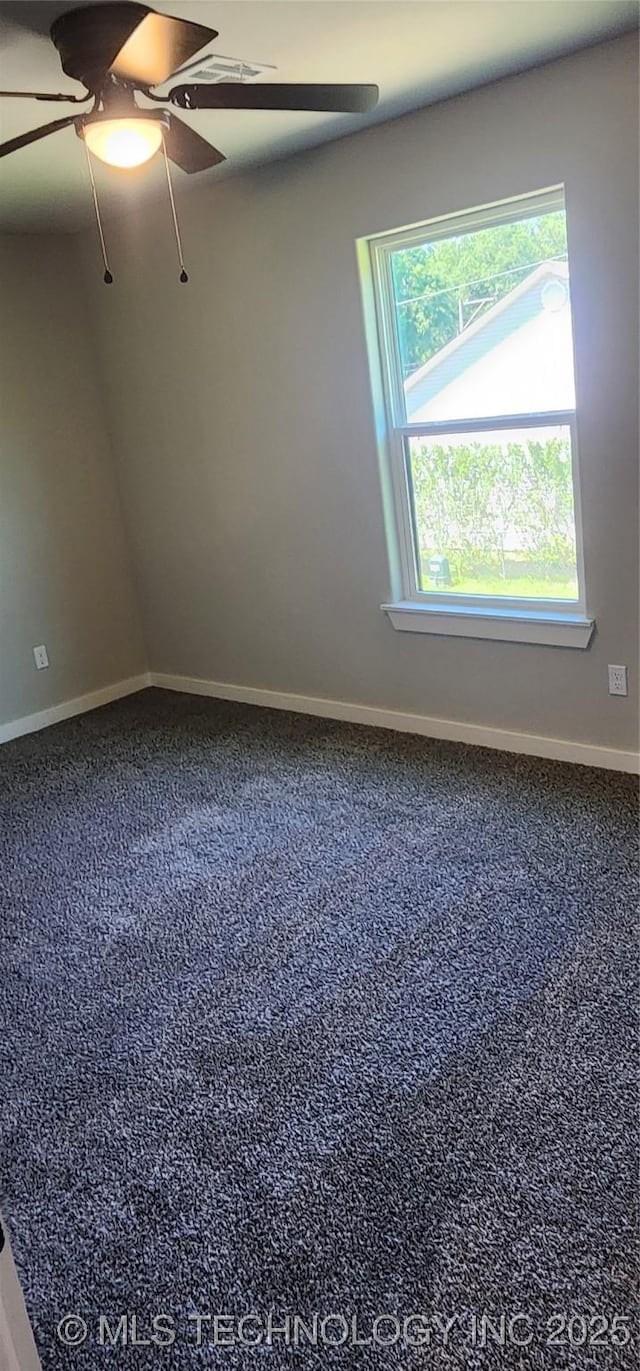 empty room with ceiling fan