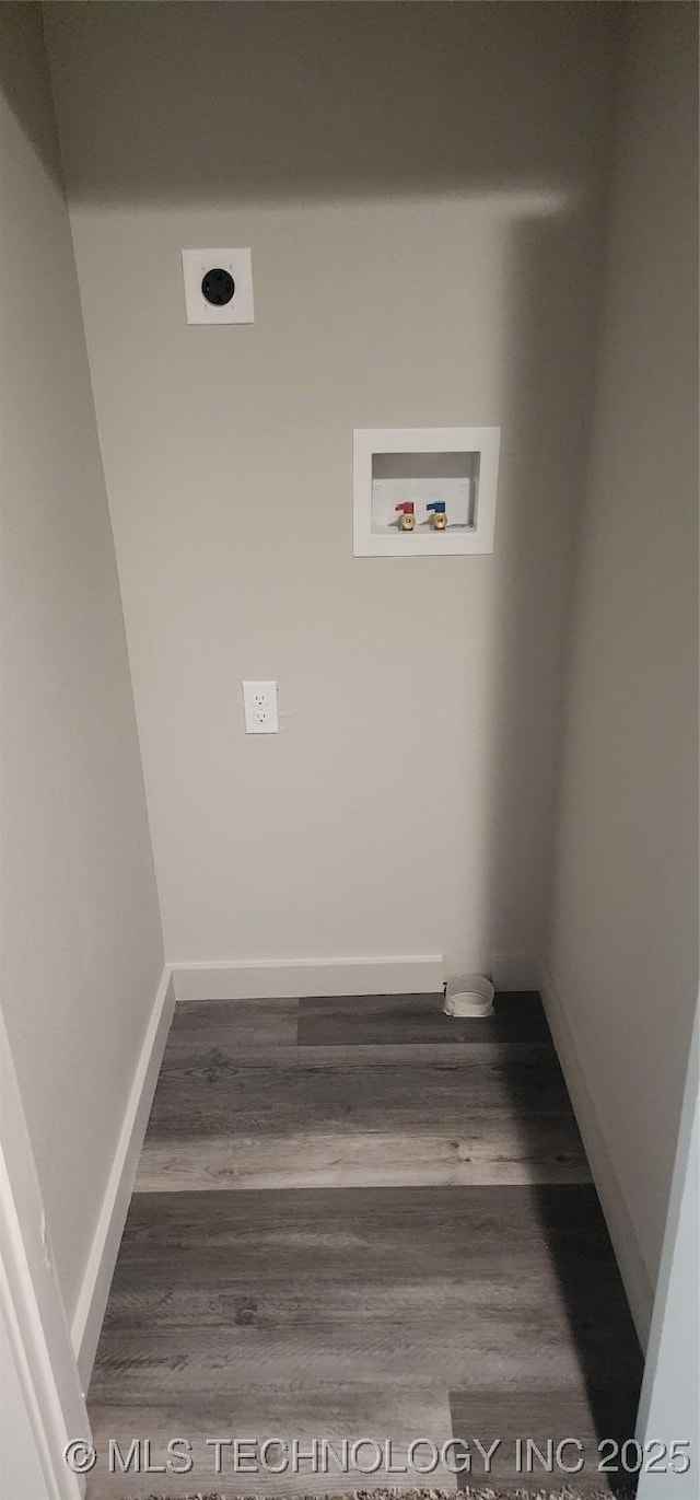 laundry area with dark wood-type flooring, washer hookup, and electric dryer hookup