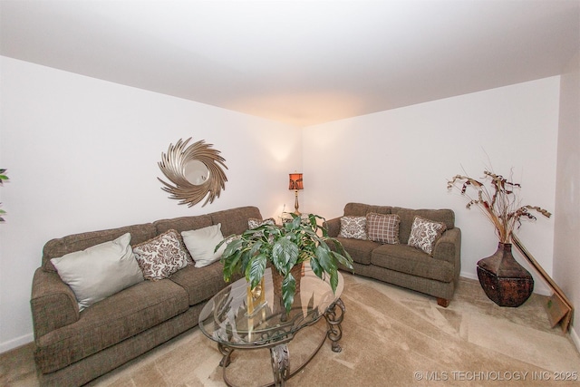 living room featuring light carpet