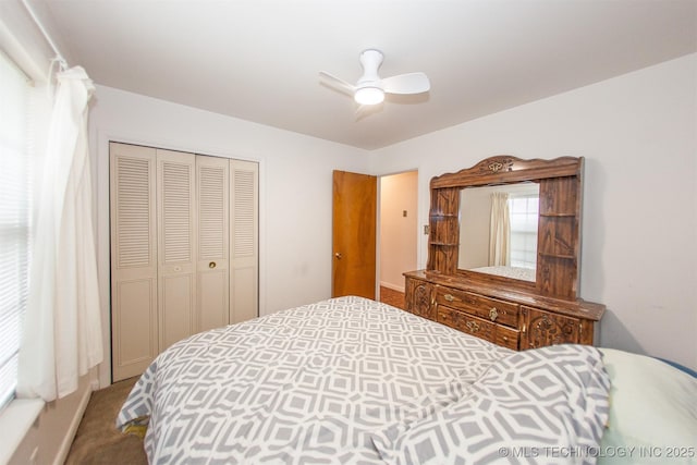 bedroom featuring carpet floors, a closet, and ceiling fan