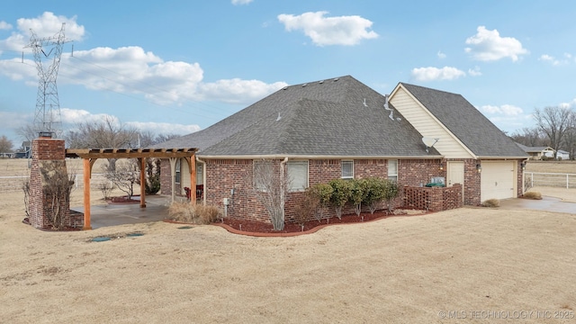 view of side of property featuring a garage