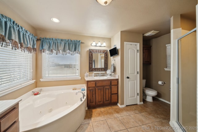 full bathroom featuring vanity, plus walk in shower, tile patterned floors, and toilet