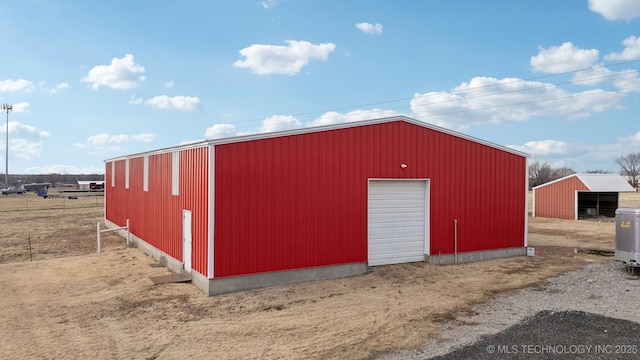 view of outbuilding with a garage