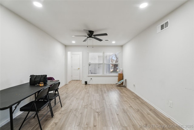 office area featuring light hardwood / wood-style floors and ceiling fan