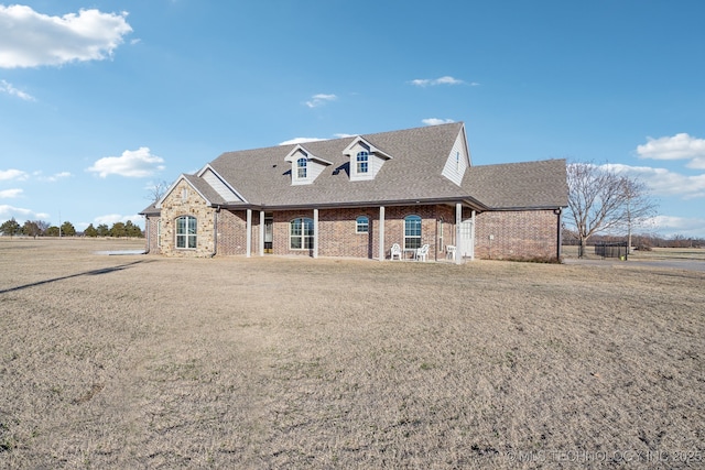 view of front of house with a front lawn