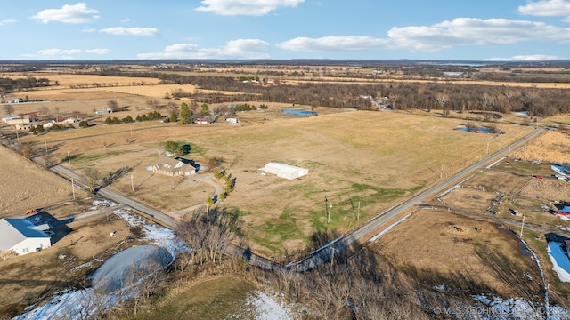 birds eye view of property featuring a rural view