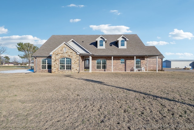 view of front of home featuring a front lawn