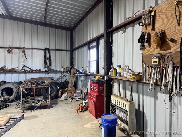 5804 Samuel Rd, Kingston, OK 73439 - garage with heating unit and a workshop area